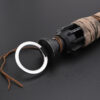 Pommel section with metallic loop attachment and leather cord accent.