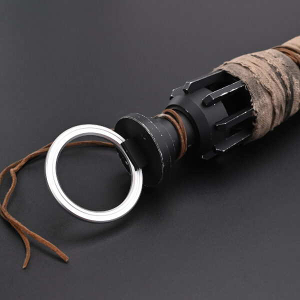 Pommel section with metallic loop attachment and leather cord accent.