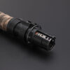 Close-up of emitter section with scorched edges and intricate vent pattern.