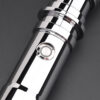 Detailed close-up of black control button on chrome body.