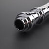 Polished emitter section with deep grooves and flared rim.