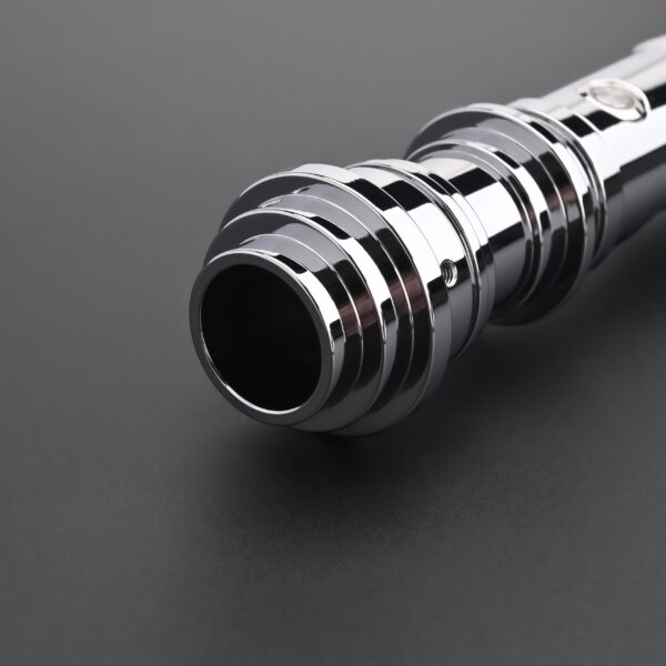 Polished emitter section with deep grooves and flared rim.