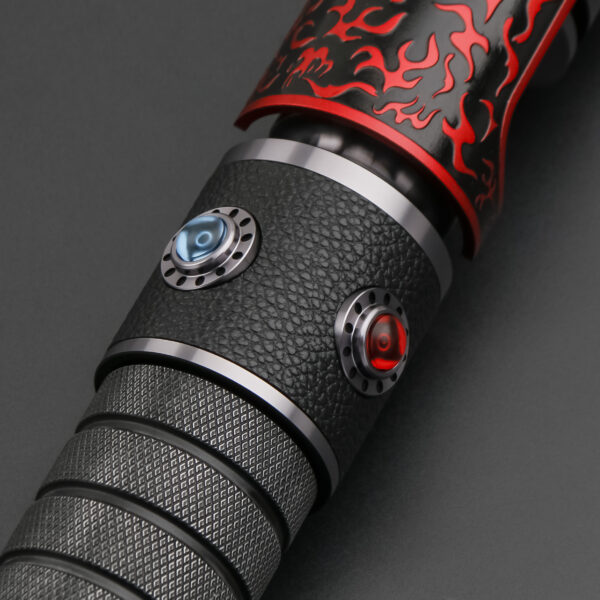Close-up of the Relic Hunter saber showing dual decorative control buttons on a textured black mid-section.