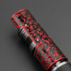 Red flame-engraved emitter shroud on the Relic Hunter custom saber.