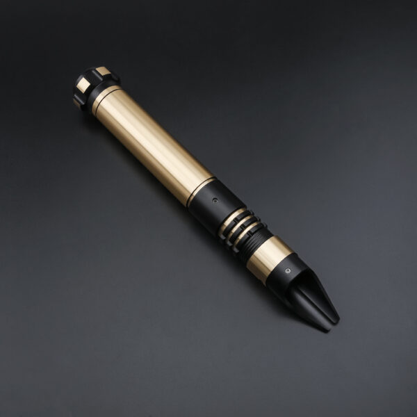 Gold-accent Crusader saber hilt laying on a dark surface, shown without the blade installed.