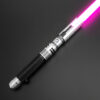 Survivor SE saber with bright magenta blade glowing against a matte black surface.
