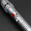 Close-up of Shadow Hunter SE hilt section showing red activation switch and silver detailing.